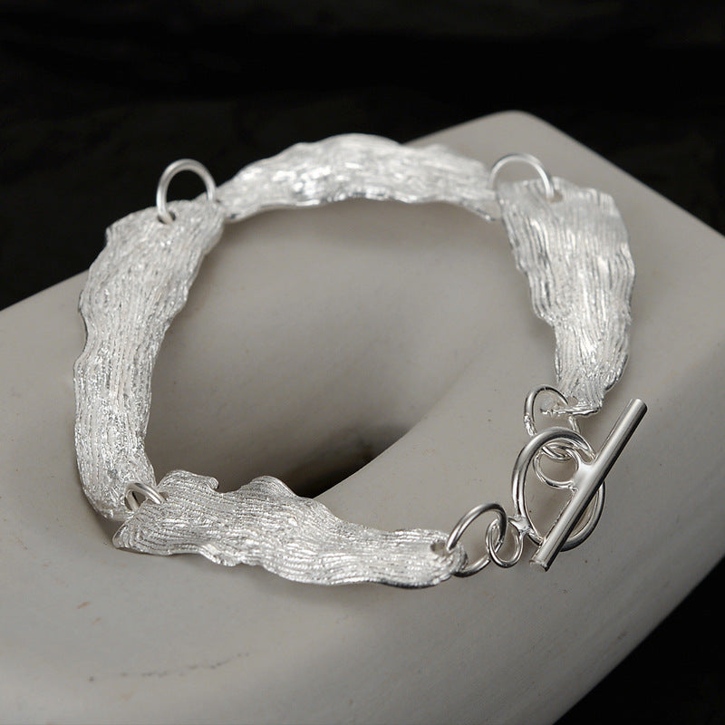 Bracelet à maillons motif feuilles froissées B1039