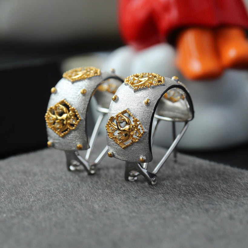 Boucles d'oreilles hirondelle ajourées soyeuses 6441