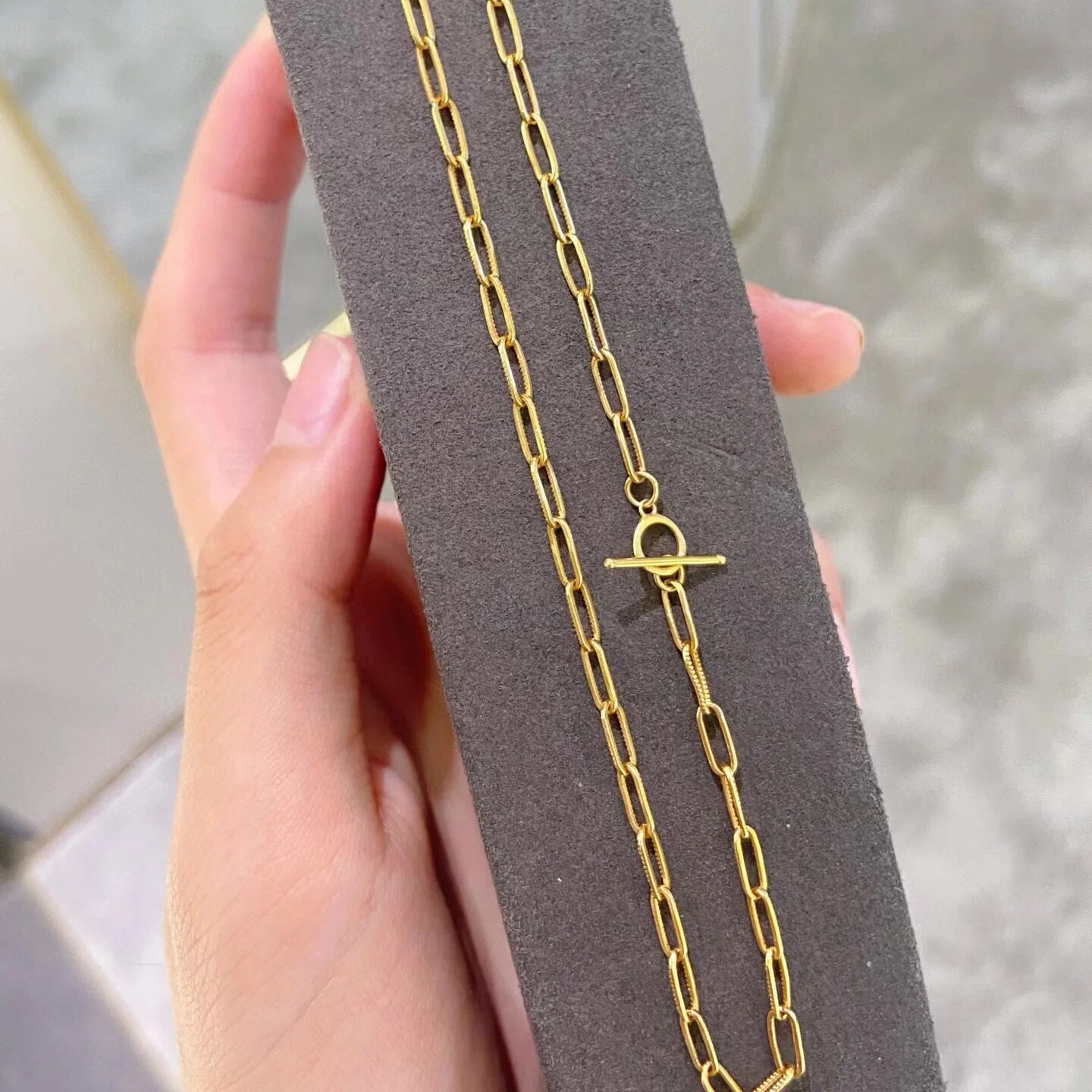 Collier barre en T à chaîne étirée moletée