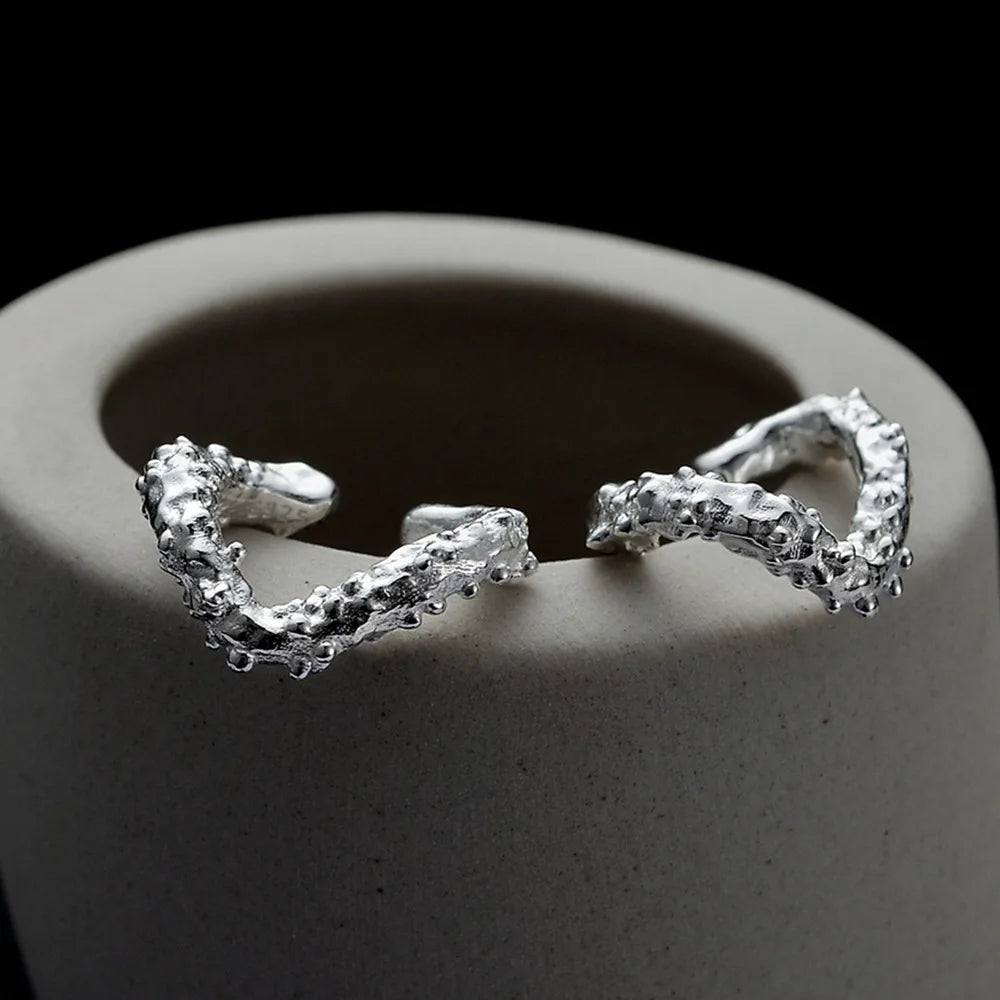 Manchette d'oreille naturelle irrégulière E1220, 1 pièce