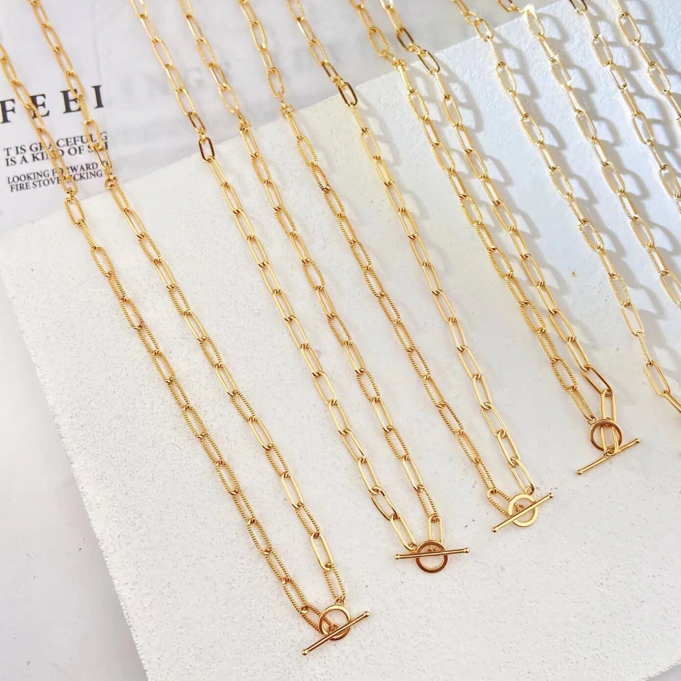 Collier barre en T à chaîne étirée moletée