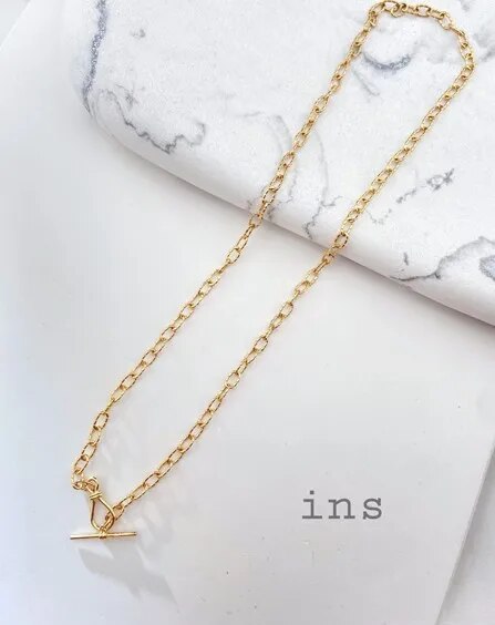 Collier chaîne torsadée à motif dappé
