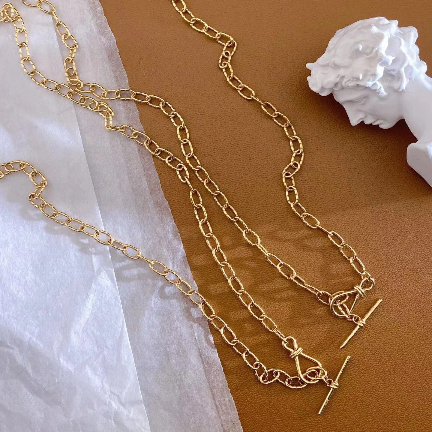 Collier chaîne torsadée à motif dappé