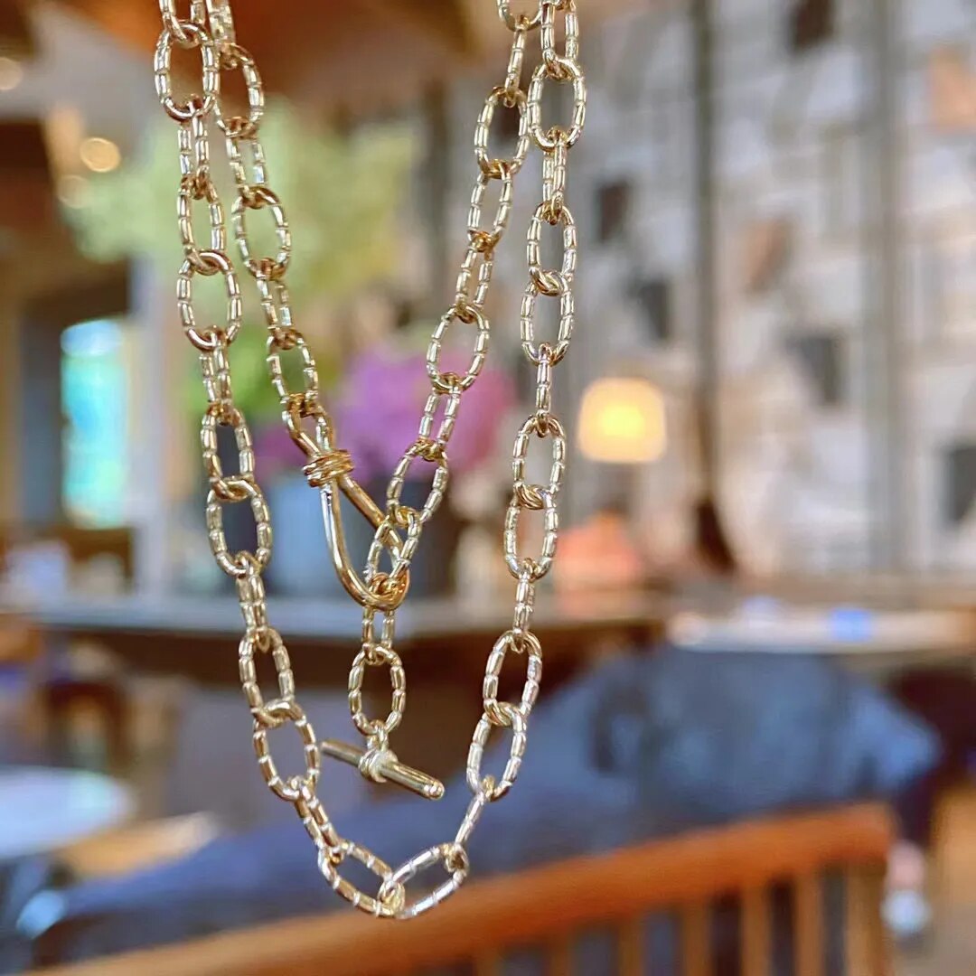 Collier chaîne torsadée à motif dappé