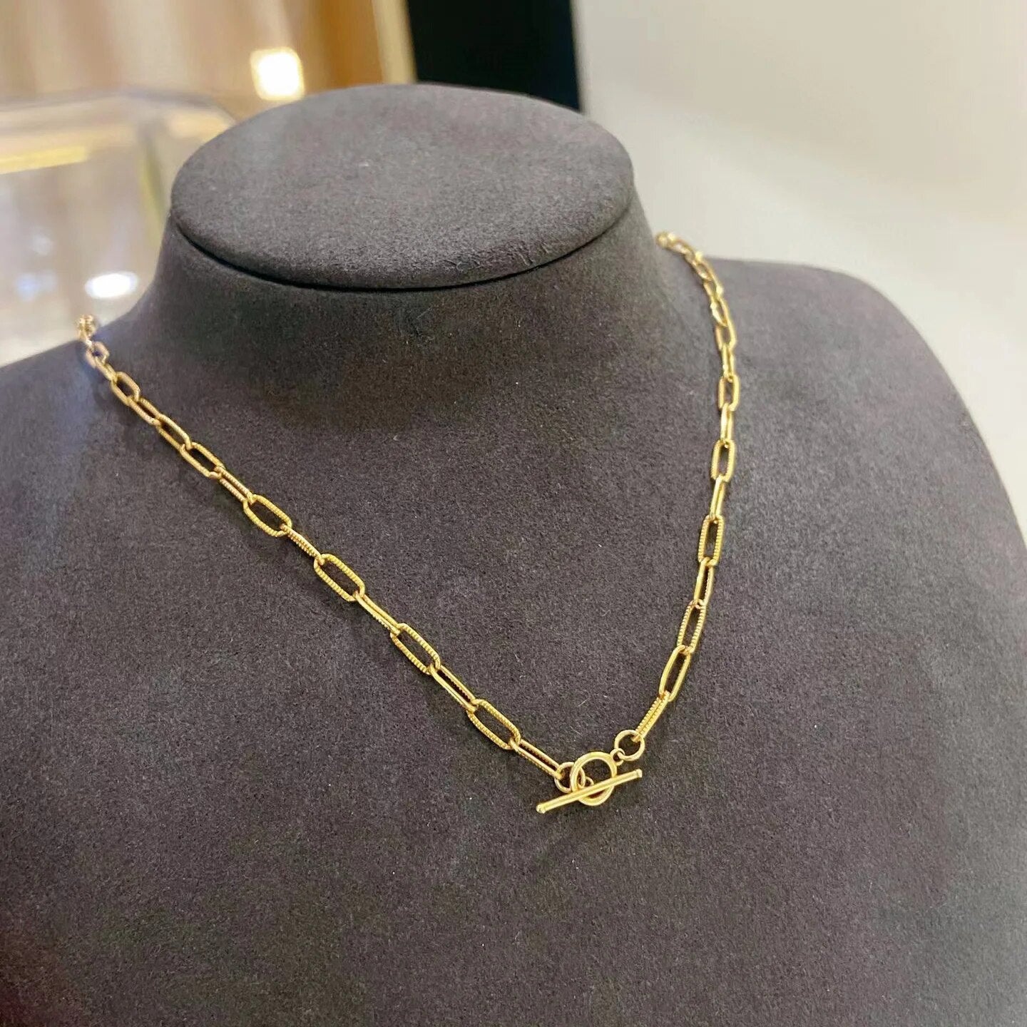 Collier barre en T à chaîne étirée moletée