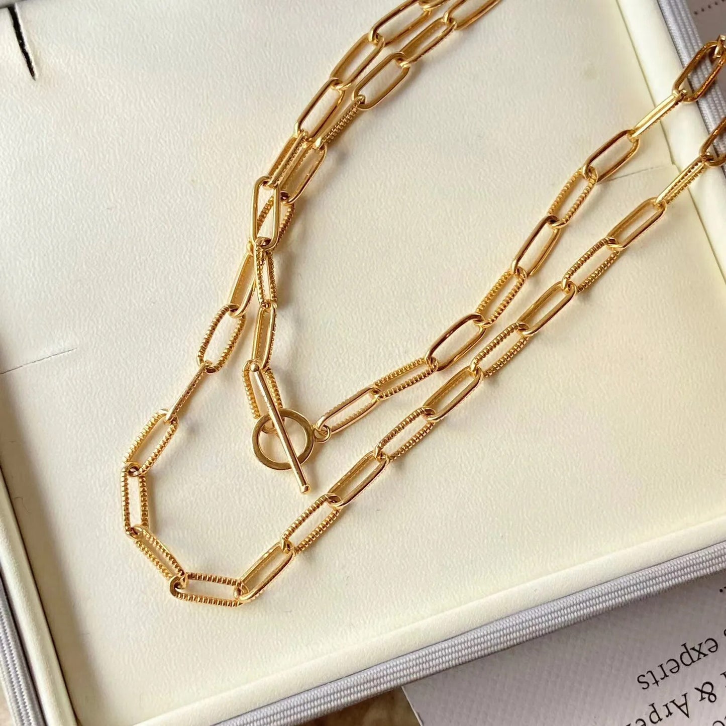 Collier barre en T à chaîne étirée moletée