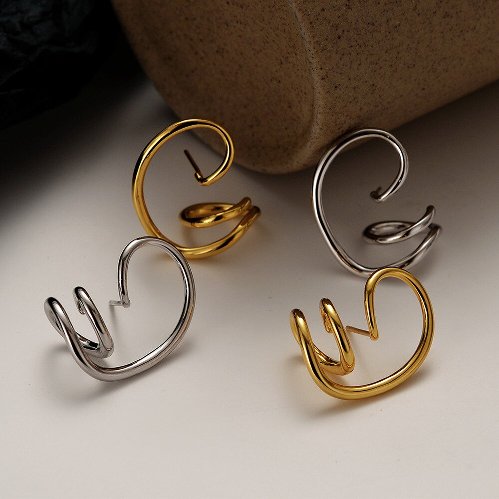 Clous d'oreilles à motif de fil abstrait E1029