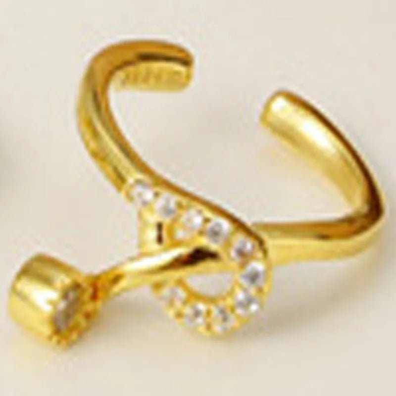 Boucle d'oreille clip nœud pavé E1010, 1 pièce