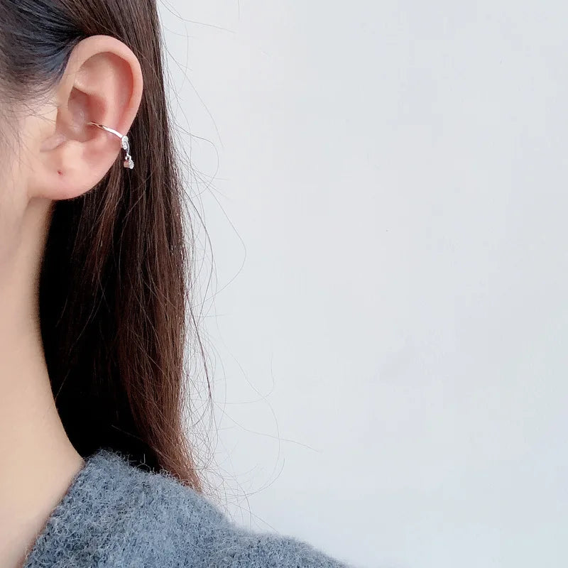 Boucle d'oreille clip nœud pavé E1010, 1 pièce