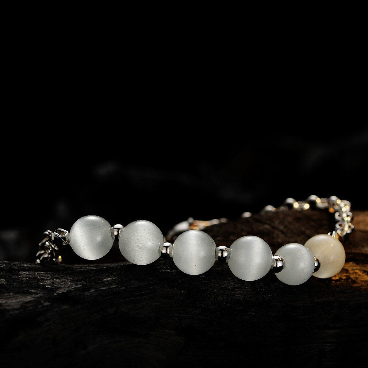 Bracelet chaîne torsadée dessiné œil de chat B1007