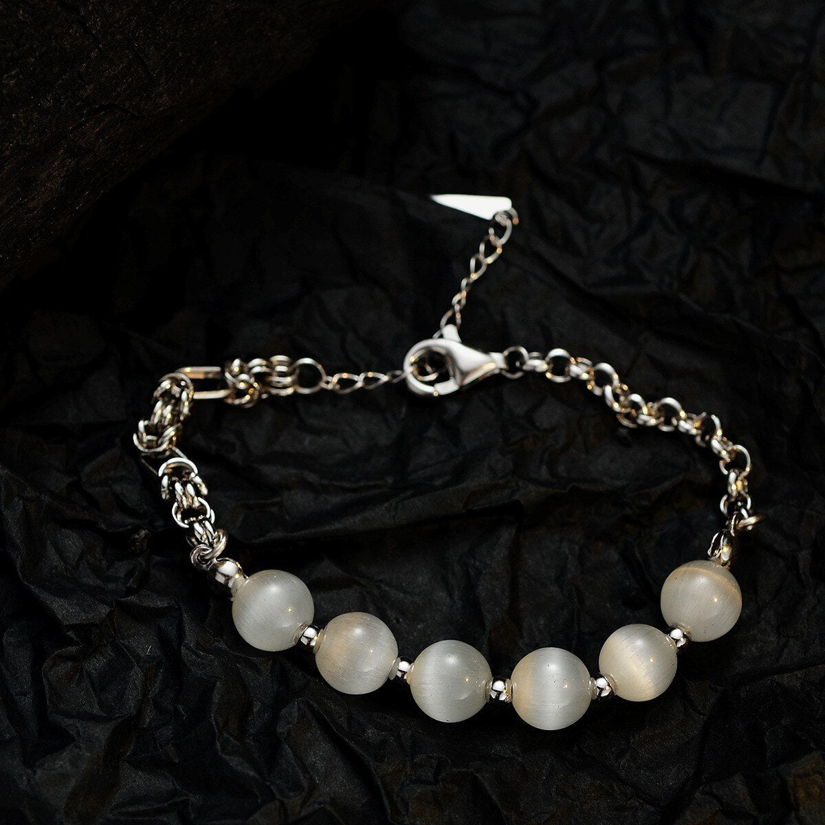 Bracelet chaîne torsadée dessiné œil de chat B1007