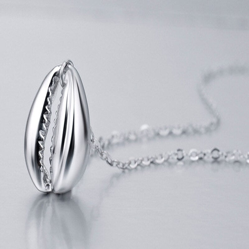 Pendentif coquille de trompette de conque N1012
