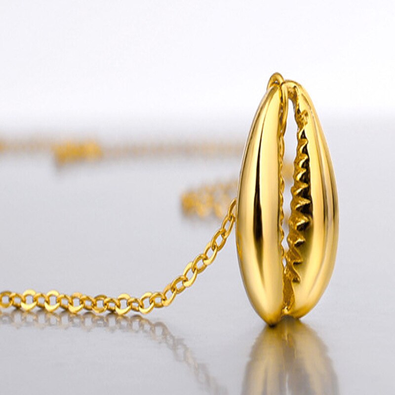 Pendentif coquille de trompette de conque N1012