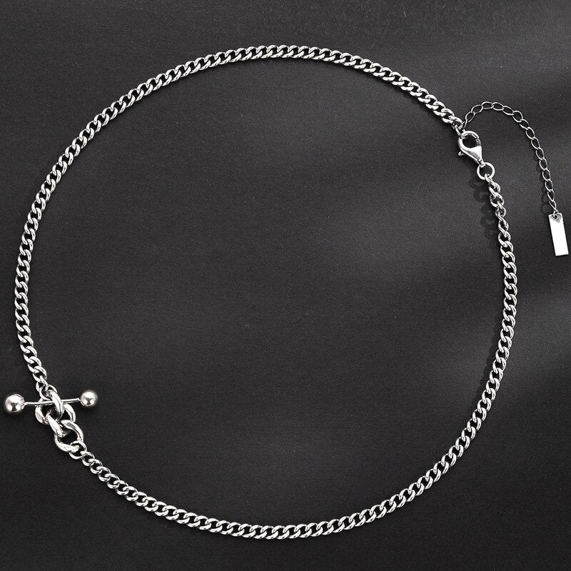 Collier chaîne gourmette à breloque haltère N1008
