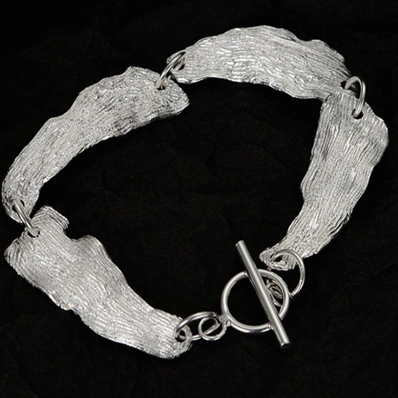 Bracelet à maillons motif feuilles froissées B1039