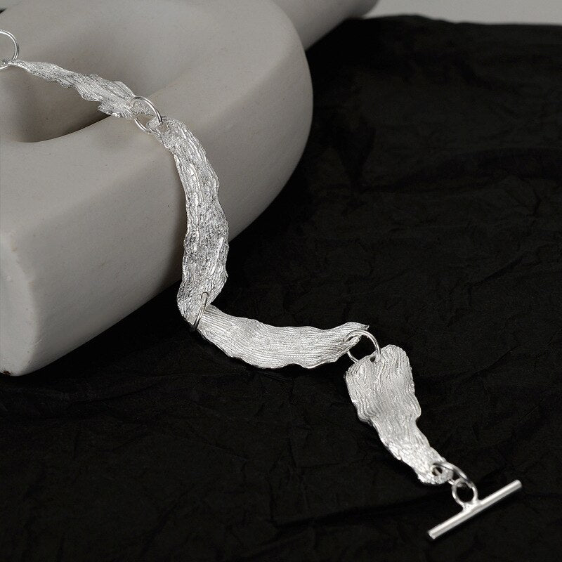 Bracelet à maillons motif feuilles froissées B1039