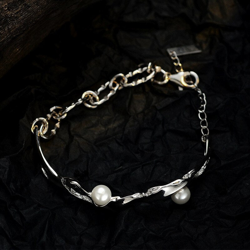 Bracelet à maillons irréguliers en perles de coquillage B1022