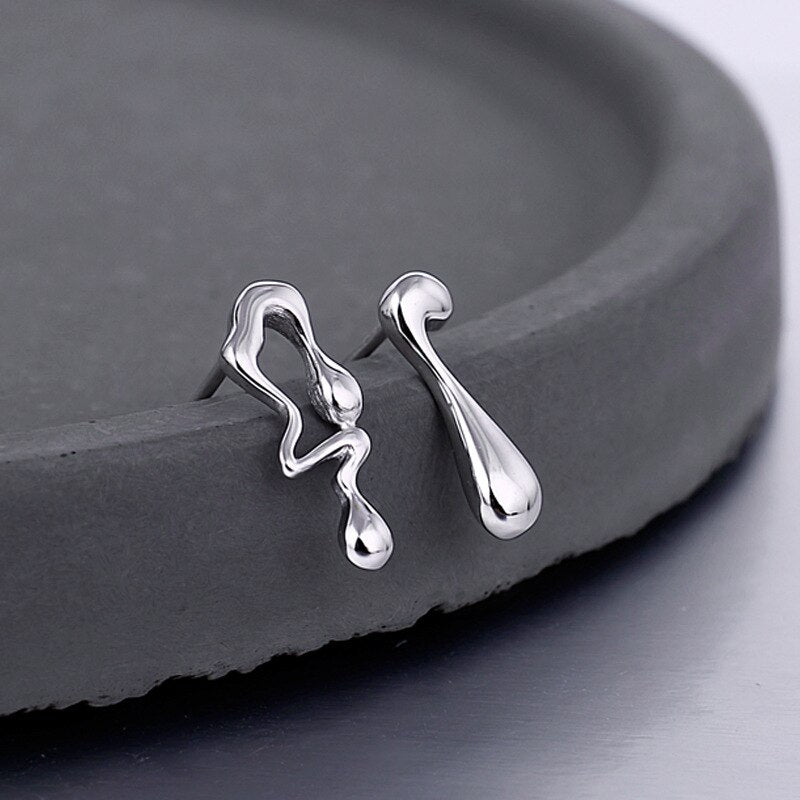 Boucles D'oreilles Puces Liquides Ondulées E1155