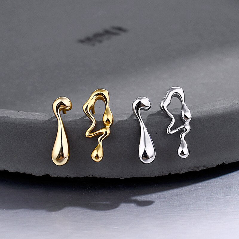 Boucles D'oreilles Puces Liquides Ondulées E1155