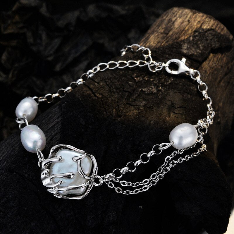 Bracelet multi-chaînes enveloppé de perles baroques B1049