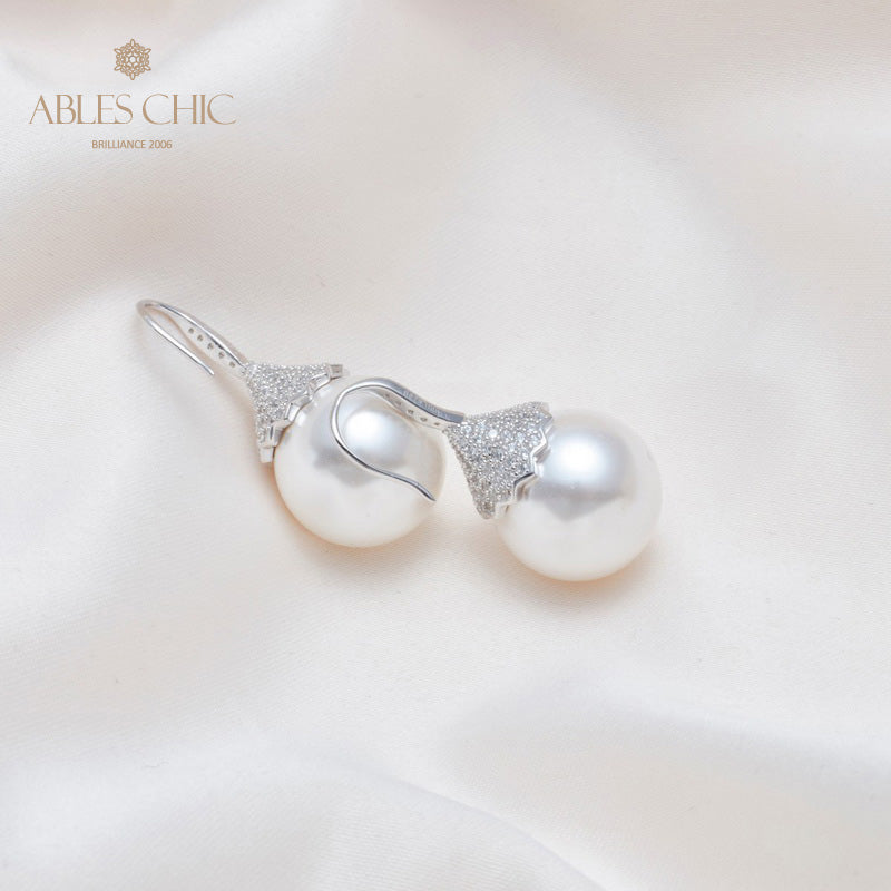 Boucle d'oreille en perles de coquille florale 5785