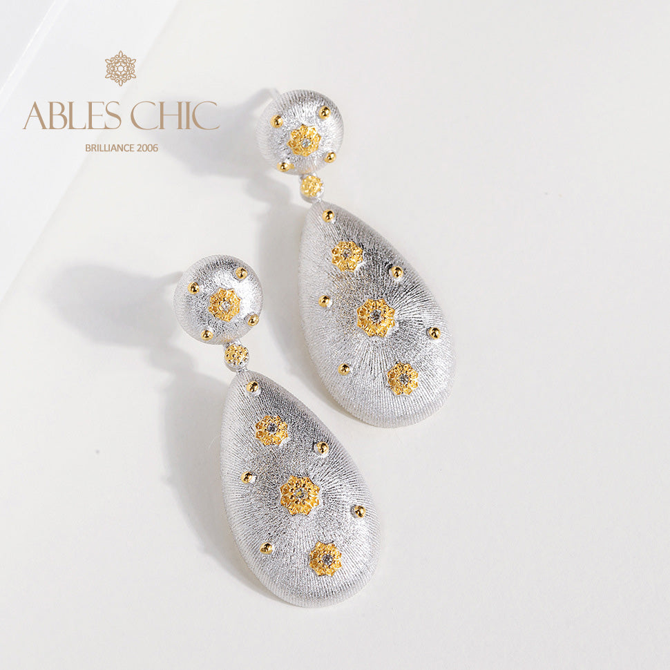 Boucles d'oreilles étoilées en forme de larme soyeuse 5050