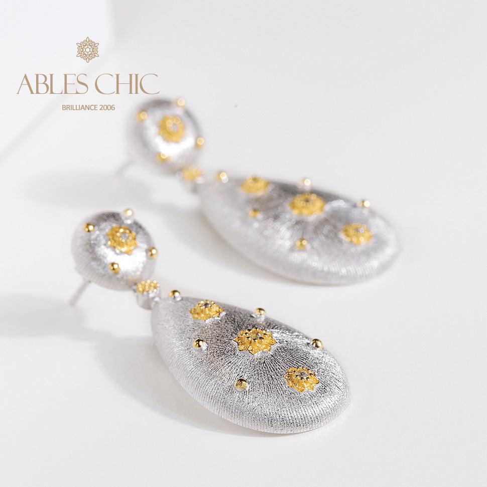 Boucles d'oreilles étoilées en forme de larme soyeuse 5050