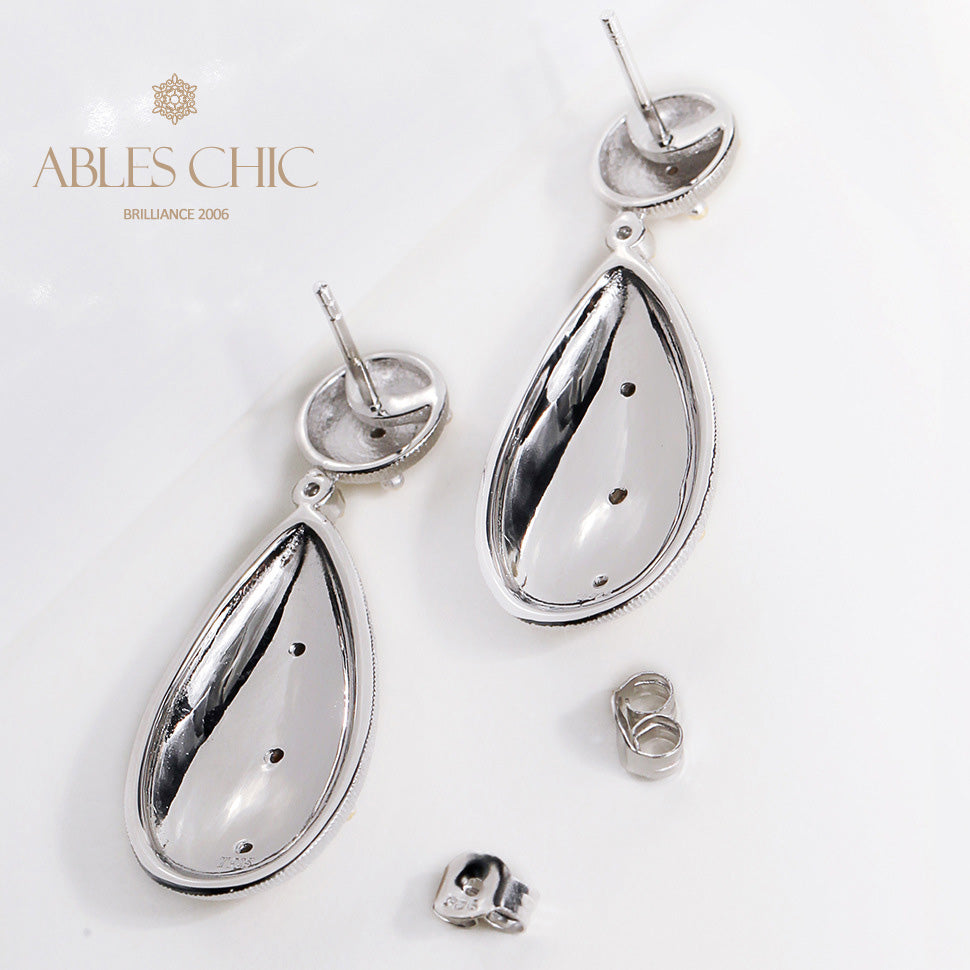 Boucles d'oreilles étoilées en forme de larme soyeuse 5050
