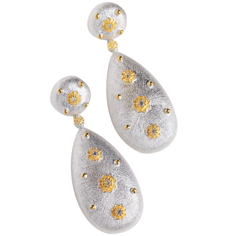 Boucles d'oreilles étoilées en forme de larme soyeuse 5050
