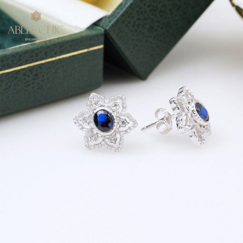 Boucles d'oreilles avec pierres précieuses et fleurs étoilées 5385