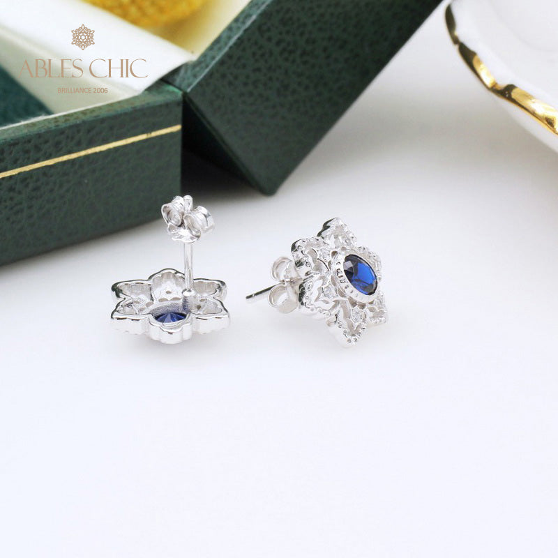 Boucles d'oreilles avec pierres précieuses et fleurs étoilées 5385