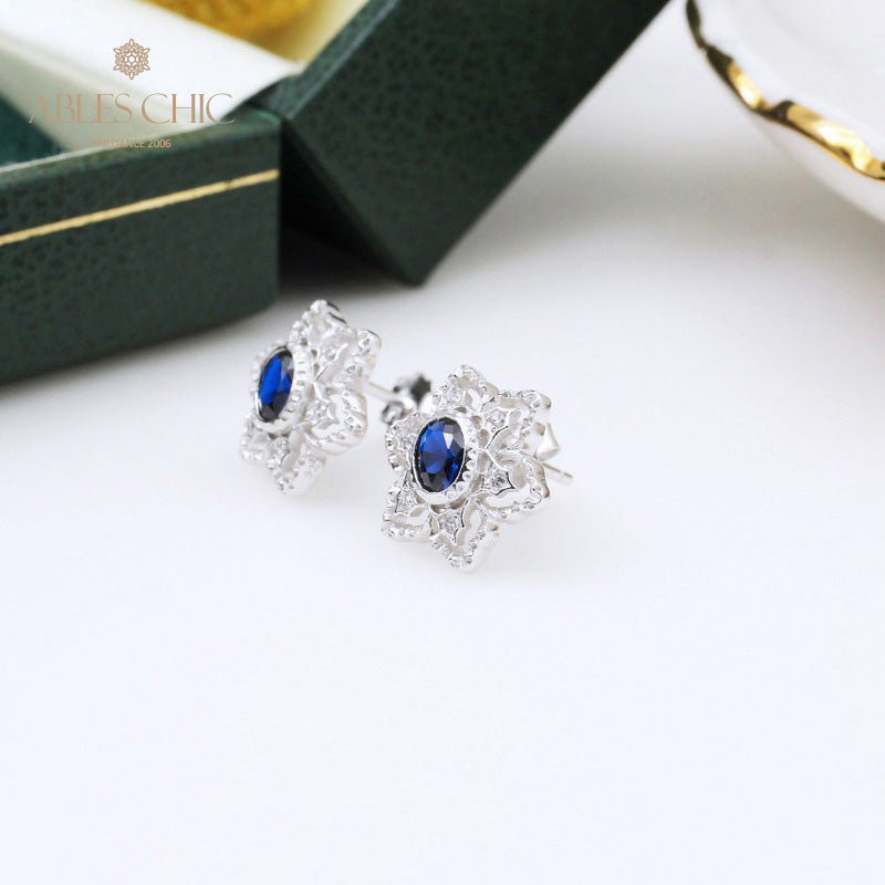 Boucles d'oreilles avec pierres précieuses et fleurs étoilées 5385