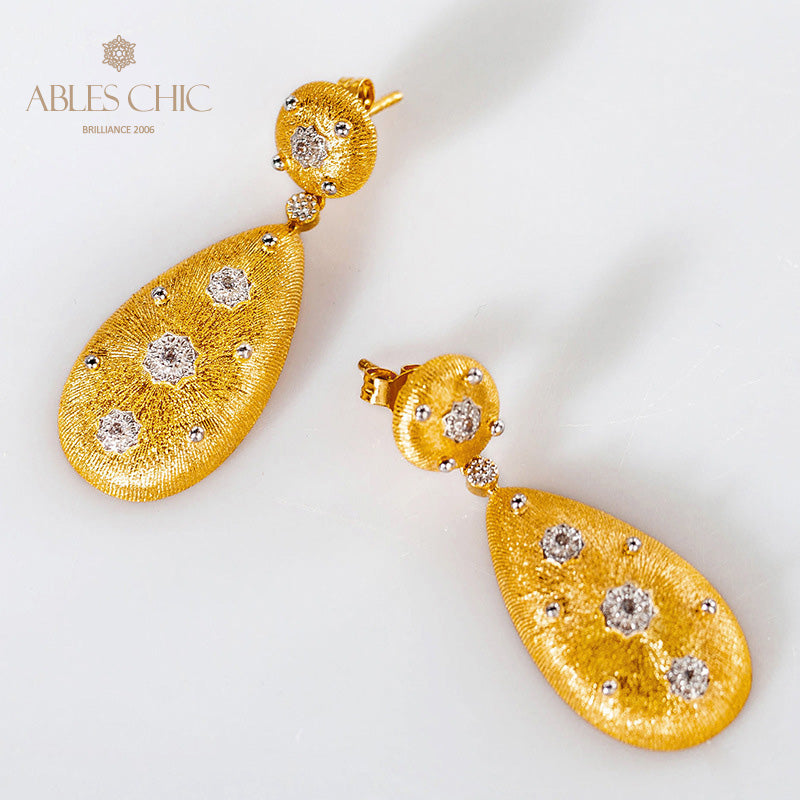 Boucles d'oreilles étoilées en forme de larme soyeuse 5050