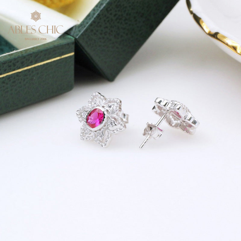 Boucles d'oreilles avec pierres précieuses et fleurs étoilées 5385