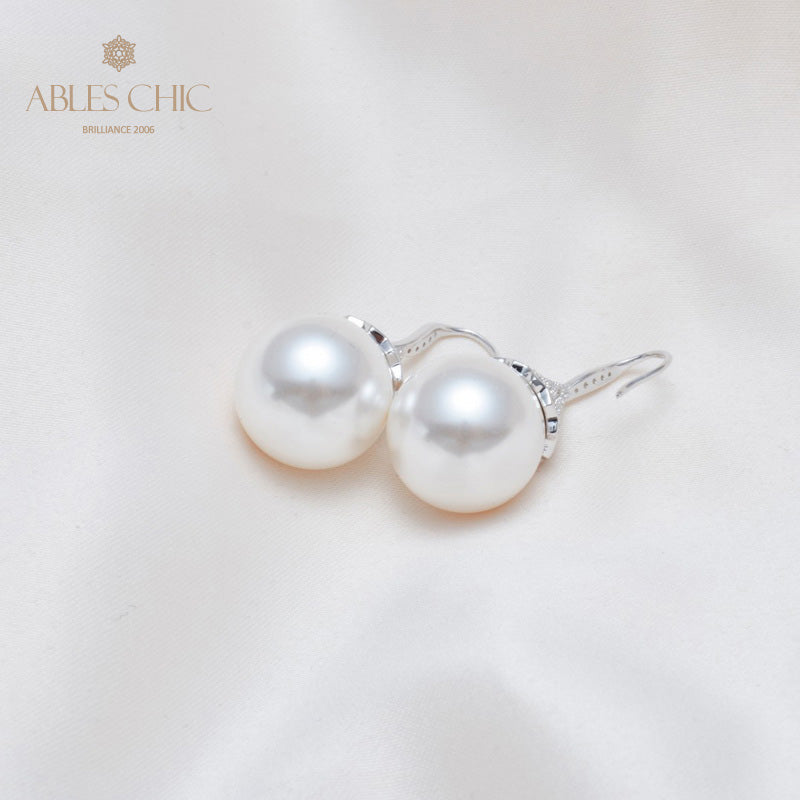 Boucle d'oreille en perles de coquille florale 5785