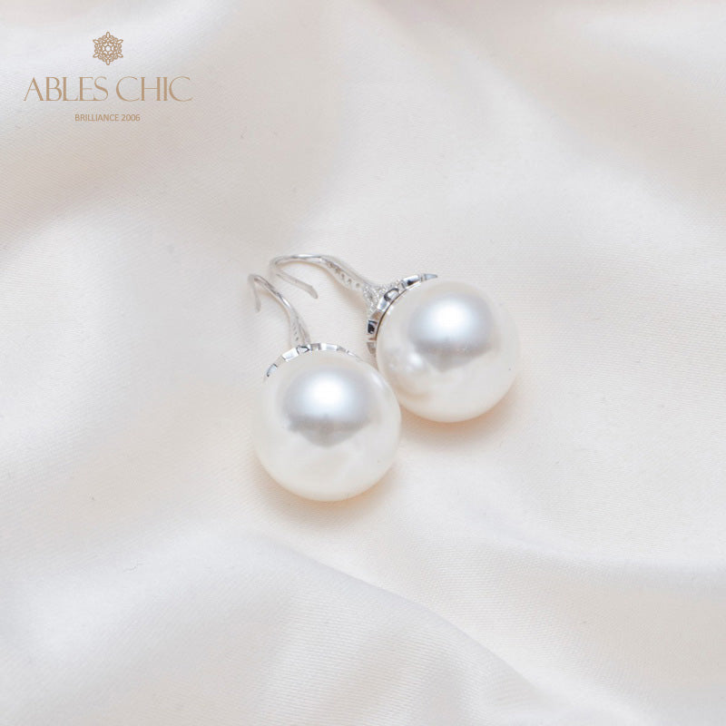Boucle d'oreille en perles de coquille florale 5785
