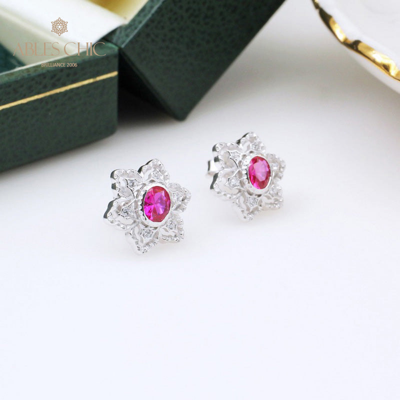 Boucles d'oreilles avec pierres précieuses et fleurs étoilées 5385