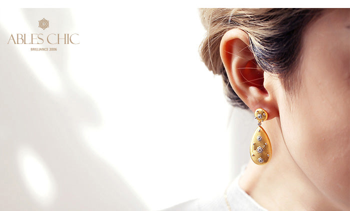 Boucles d'oreilles étoilées en forme de larme soyeuse 5050
