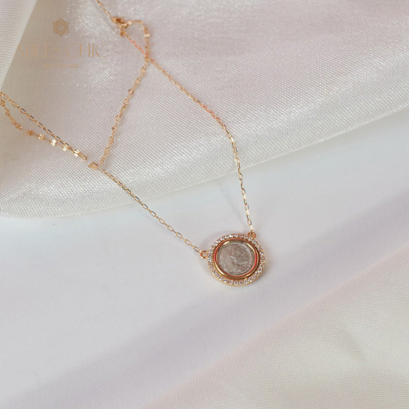 Collier médaillon réversible grec