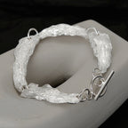 Bracelet à maillons motif feuilles froissées B1039