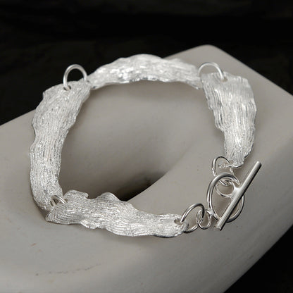 Bracelet à maillons motif feuilles froissées B1039
