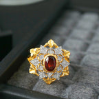 Bague ajourée florale grenat 6364