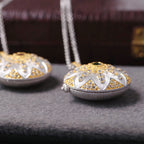 Pendentif médaillon fleur soyeuse 6401