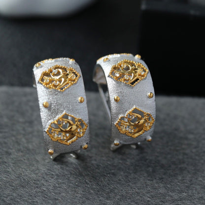 Boucles d'oreilles hirondelle ajourées soyeuses 6441
