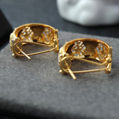 Boucles d'oreilles hirondelle ajourées soyeuses 6441