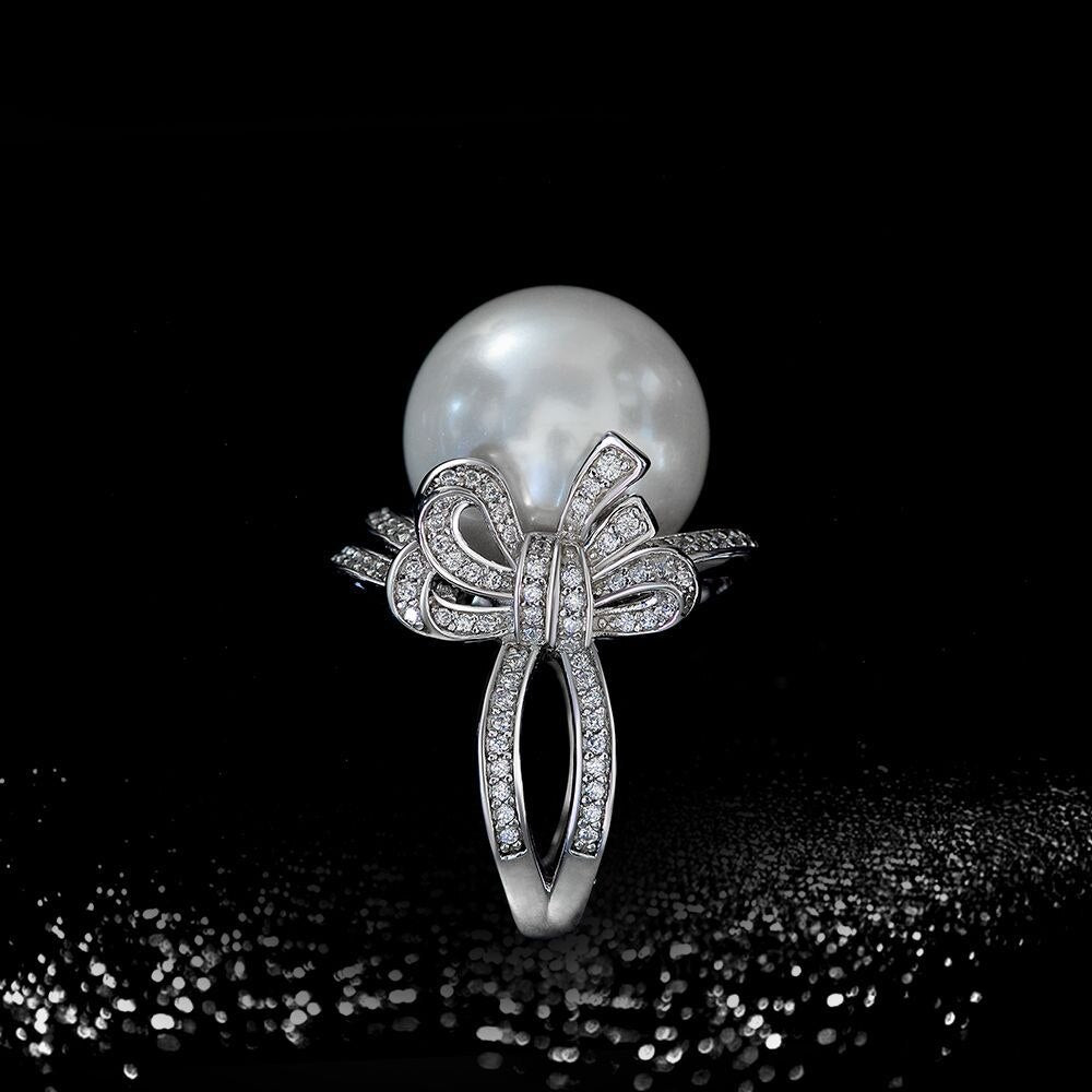 Bague solitaire nœud papillon en nacre R1168