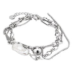 Bracelet multi-chaînes de perles baroques B1028