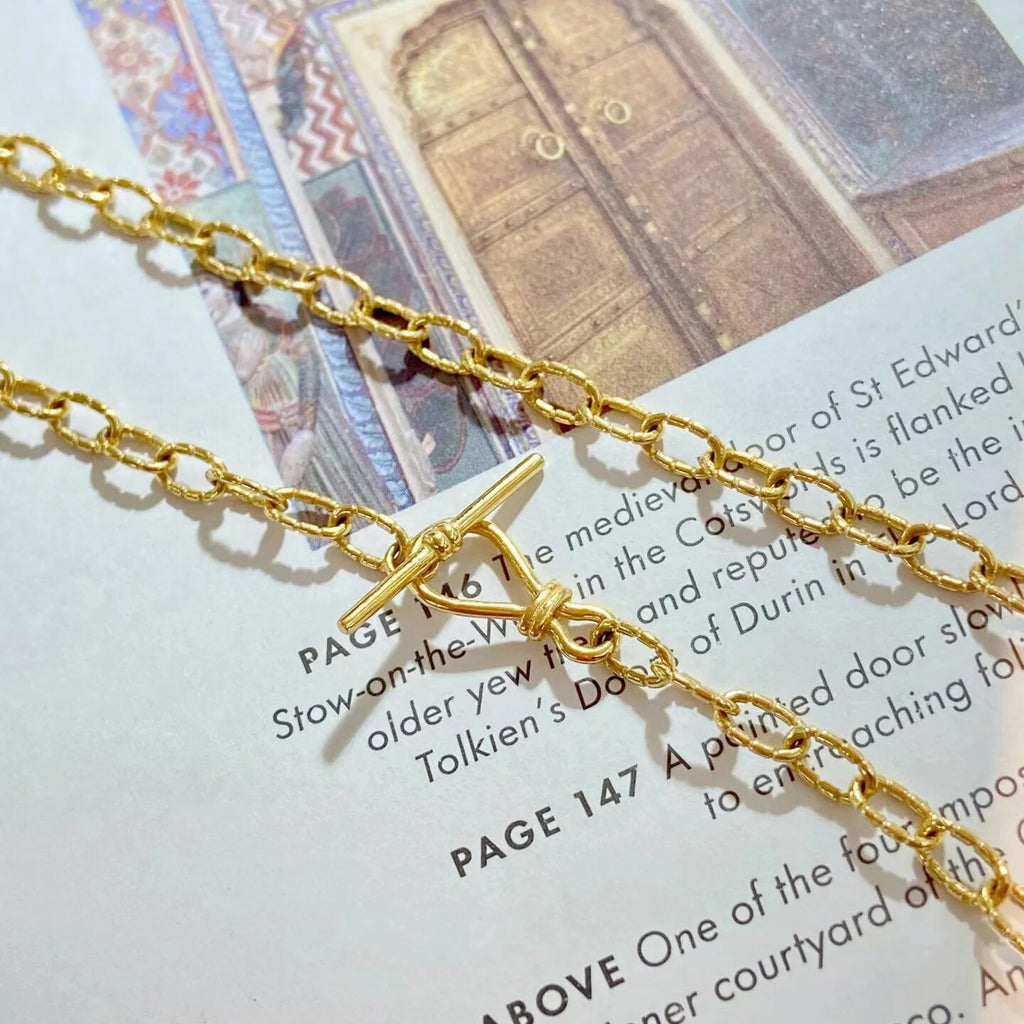 Collier chaîne torsadée à motif dappé