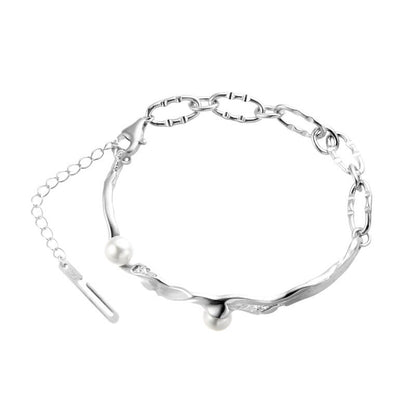 Bracelet à maillons irréguliers en perles de coquillage B1022