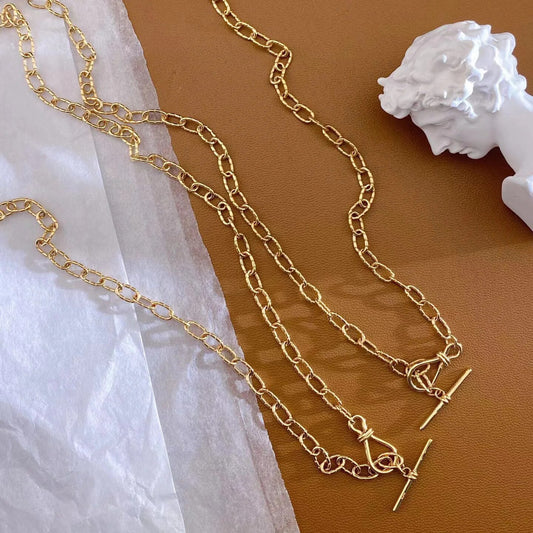 Collier chaîne torsadée à motif dappé